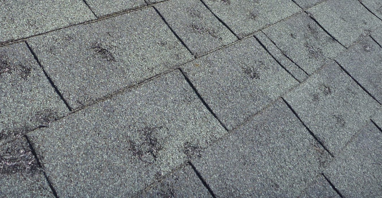 Emergency roof tarp storm damage - Camdenton roofing, John Beal Roofing Lake of the Ozarks